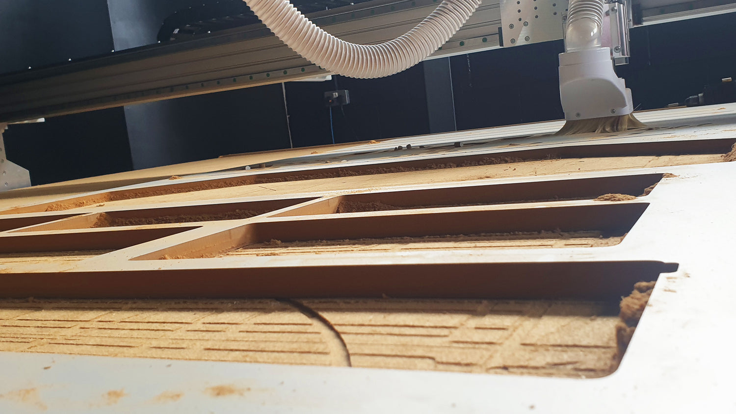 Hybrid CNC Mid-Cut Precision technology demonstration. Showcasing high-accuracy cutting for CNC machining in woodworking, signage, and industrial fabrication.