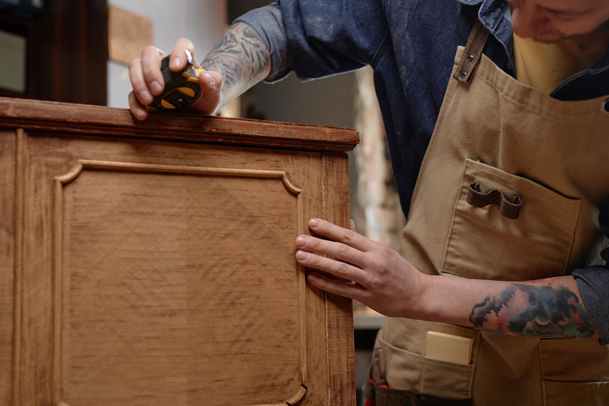 Precise measuring of timber panel for CNC woodworking applications.